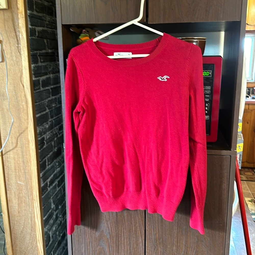 Red Hollister sweater in size M